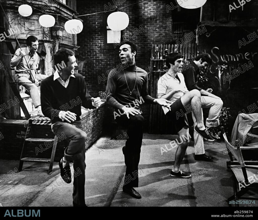 CLIFF GORMAN and KENNETH NELSON in THE BOYS IN THE BAND, 1970, directed by WILLIAM FRIEDKIN. Copyright CINEMA CENTER/LEO.