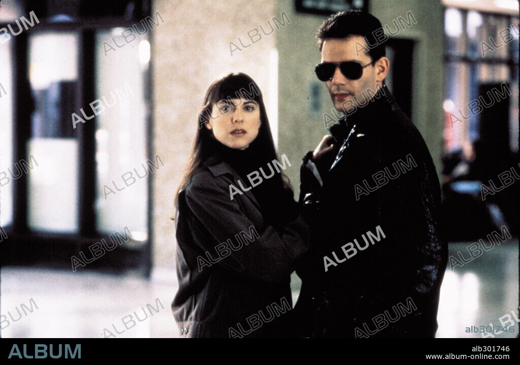 CAMPBELL SCOTT y REBECCA PIDGEON en LA TRAMA, 1997 (THE SPANISH PRISONER), dirigida por DAVID MAMET. Copyright SWEETLAND FILMS.
