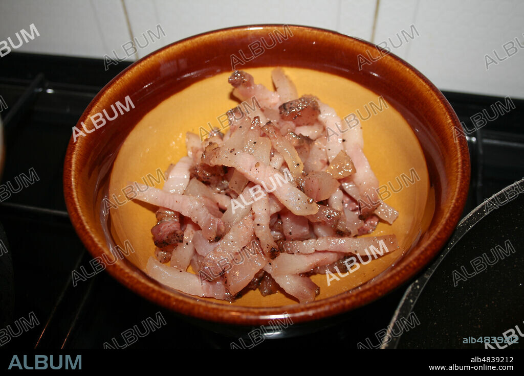 4 - Pork cheek fried in a pan, is set aside. Italian cuisine, original recipe Pasta alla gricia, typical dish of the Lazio region. Ingredients:. 400 g of spaghetti or rigatoni, 250 g of Amatrice pork cheek, 150 g of grated pecorino from Amatrice, pepper to taste, coarse salt to taste.