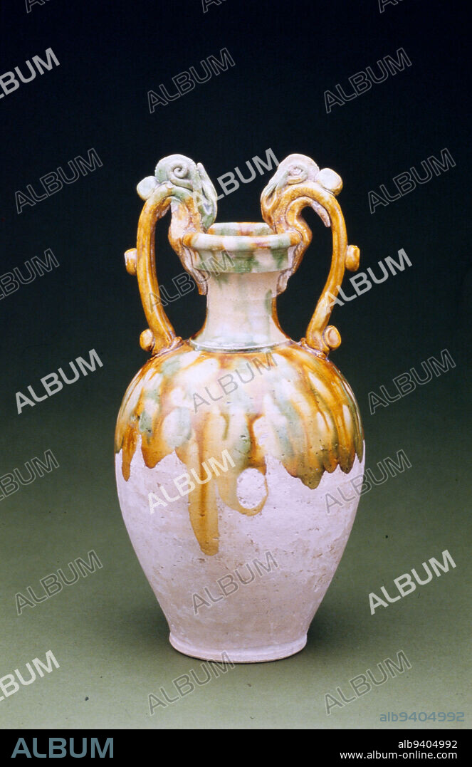 Amphora, late 7th-8th century, 10 1/4 x 5 1/4 in. (26.04 x 13.34 cm), Sancai ware Stoneware with three-color glaze, China, 7th-8th century, The showy magnificence of light-bodied wares covered with splashed san cai glazes became hallmarks of the early Tang dynasty. This amphora exhibits a Hellenistic shape which relates it to the extensive trade contacts that China enjoyed with Central Asia and the Middle East during the seventh and eighth centuries.