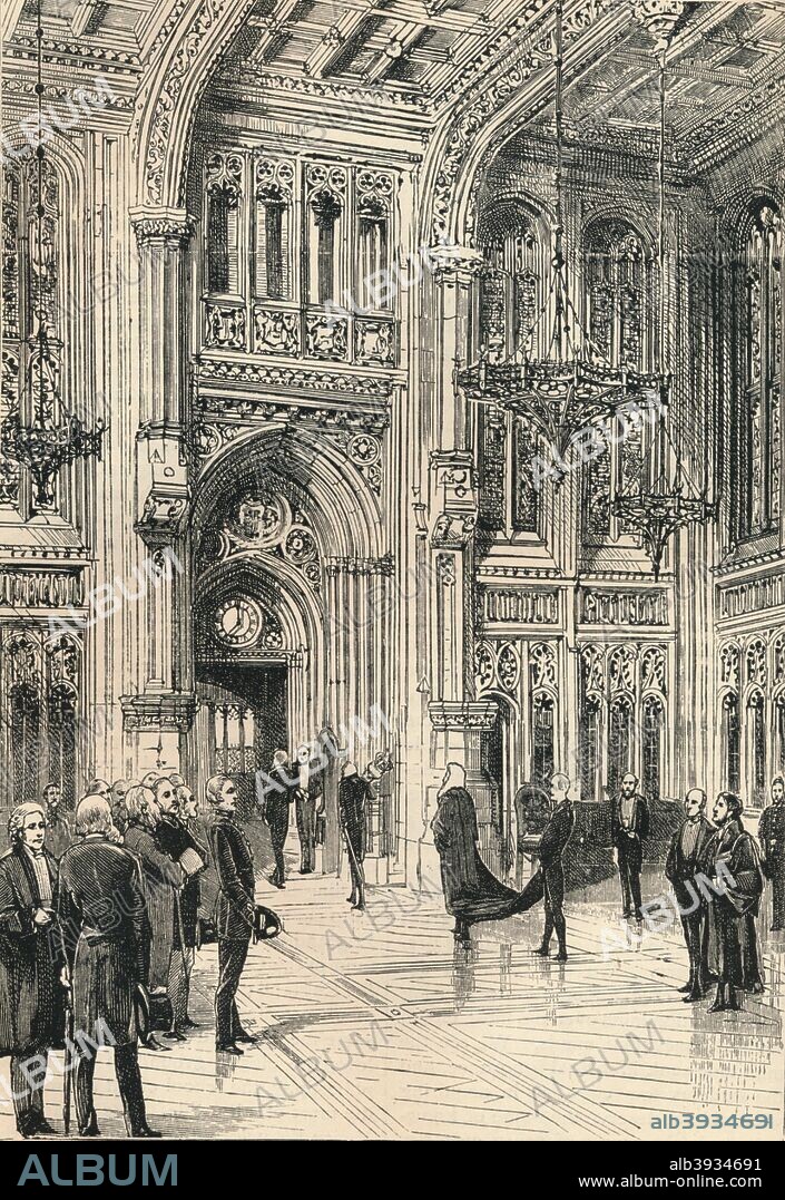 The Members' Lobby is a hallway in the Palace of Westminster used by members of the House of Commons, the lower house of the Parliament of the United Kingdom. Members of Parliament may congregate here for informal discussions. The Members' Lobby was restored after its destruction in World War II. The bomb-damaged arch at the entrance to the Commons was retained. It is now known as the Churchill Arch. Here we see the Lobby in its original state, before its near destruction in the blitz. From a 'Pictorial Record of Remarkable Events in The History of the World', published by James Sangster and Co., c1910.