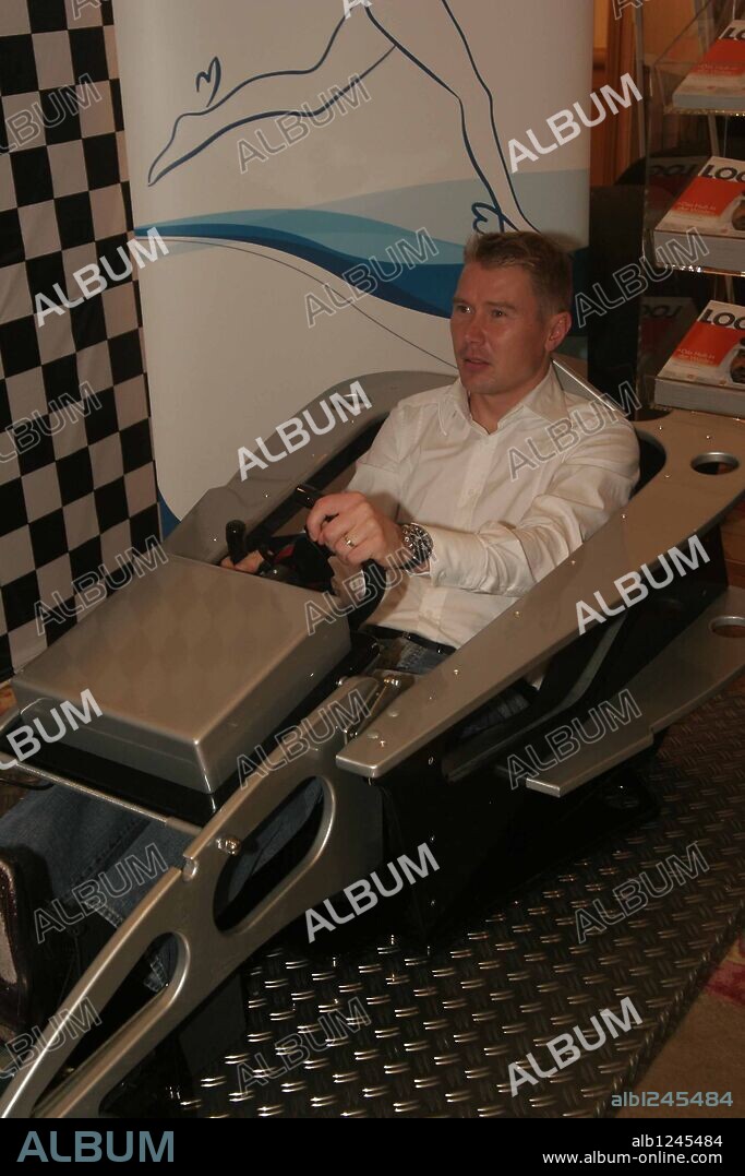 Former Formula 1 World Champion Mika Haekkinen sits in Berlin (Germany) in a race imulator without wheels..Foto: SCHROEWIG/Gudath....www.SCHROEWIG.de....SCHROEWIG/News & Images..Theodor-Heuss-Platz 8..D-14052 Berlin (Germany)..Fon +49 - 30 - 892 10 76..Fax +49 - 30 - 893 36 17..Mobil +49 - 172 - 396 55 44....Commerzbank, Konto 194 36 46, BLZ 100 400 00. 19/10/2005