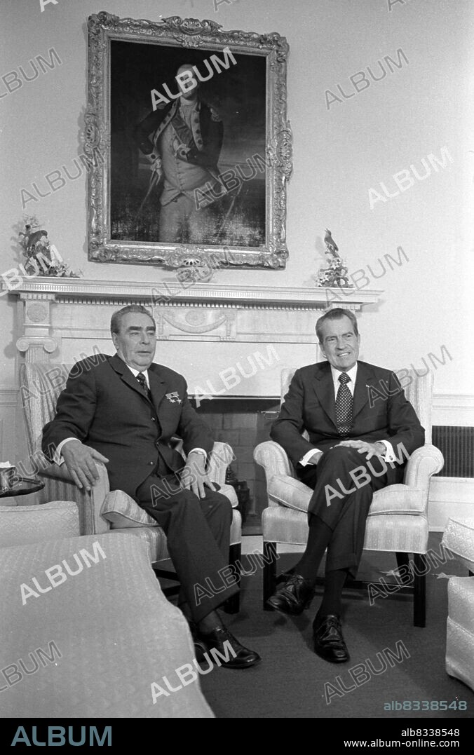 U.S. President Richard Nixon with (left to right) Soviet leader Leonid Brezhnev, Soviet Minister of Foreign Affairs Andrei Gromyko, and Secretary of State William P. Rogers, toasting the signing of agreements between the two countries on oceanography, transportation and cultural exchange. 1973.