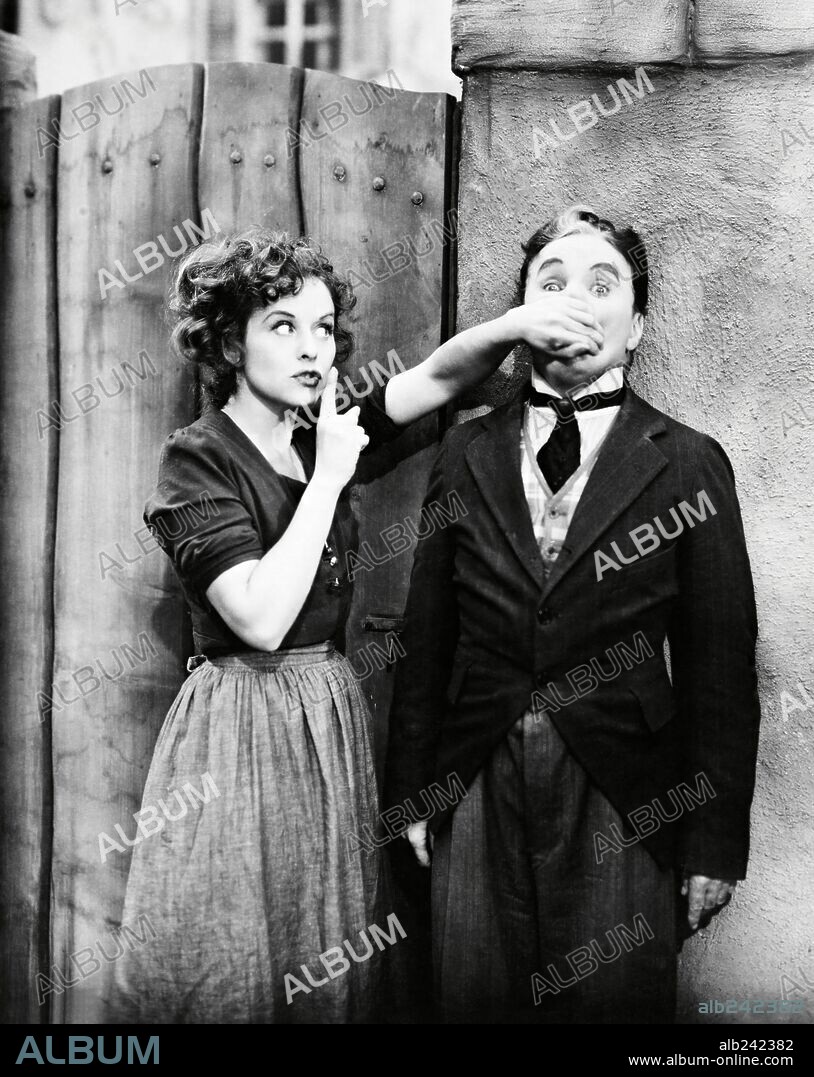 CHARLIE CHAPLIN y PAULETTE GODDARD en EL GRAN DICTADOR, 1940 (THE GREAT DICTATOR), dirigida por CHARLES CHAPLIN. Copyright UNITED ARTISTS.