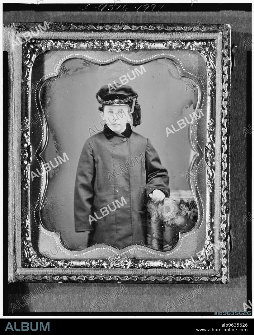 ABRAHAM BOGARDUS. George Leverett Stowell as a boy, three-quarter length portrait, standing, full face, with hand on table with tablecloth, ca. 1855.