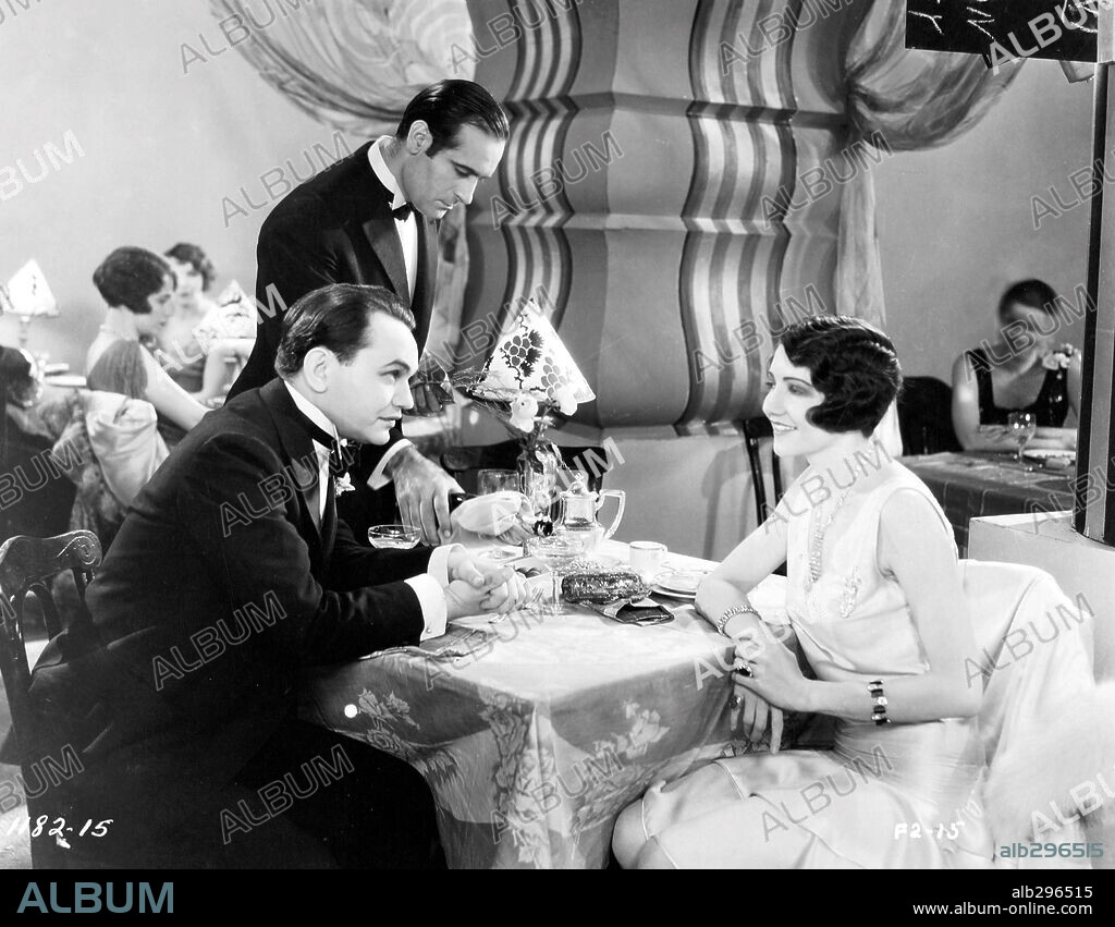 CLAUDETTE COLBERT and EDWARD G. ROBINSON in THE HOLE IN THE WALL, 1929, directed by ROBERT FLOREY. Copyright PARAMOUNT PICTURES.