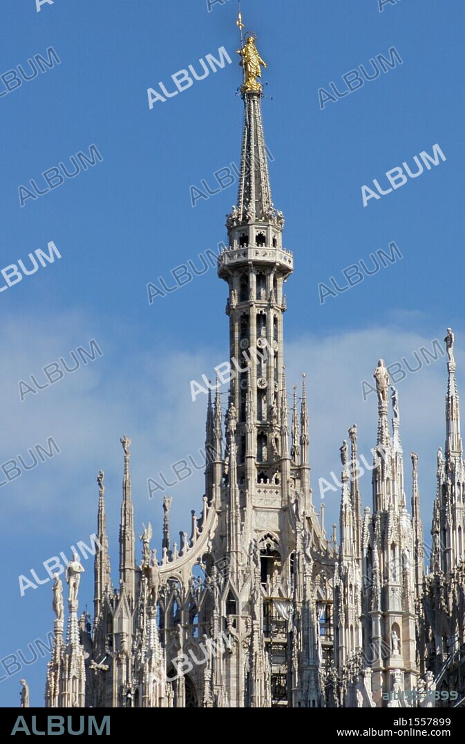 Italy. Milan Cathedral. Spire by Francesco Croce, with the Madonnina (Virgin Mary), baroque gilded bronze statue by Giuseppe Perego. 18th century.