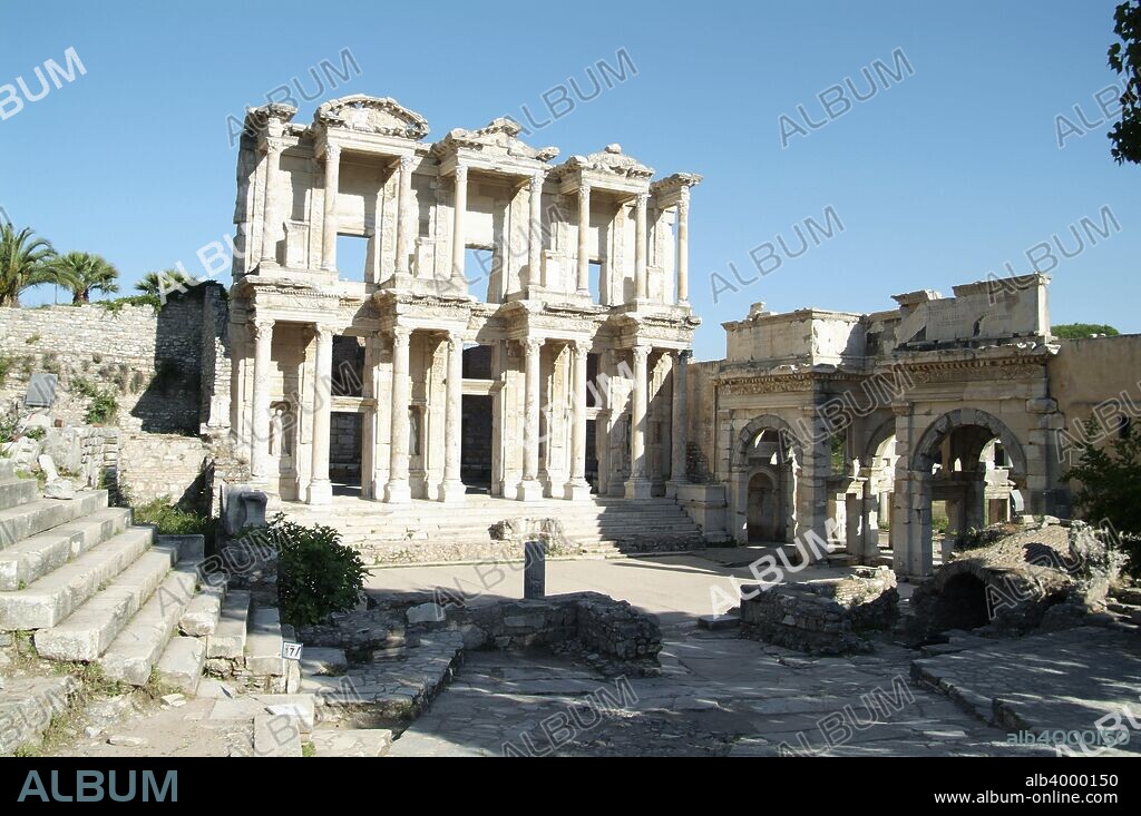 Celsus Library and Gate of Mithridates, Ephesus, Turkey. The library at Celsus is one of the most beautiful structures in Ephesus. Built in 117 AD it was a monumental tomb for Gaius Julius Celsus Polemaeanus, the governor of the province of Asia; a gift from his son Galius Julius Aquila. The grave of Celsus was located beneath the ground floor, across the entrance, and had a statue of Athena looking down on it. Ephesus was once the most important commercial centre of the ancient world and also a religious centre for early Christians. It was one of the twelve cities of the Ionian League during the Classical Greek period.