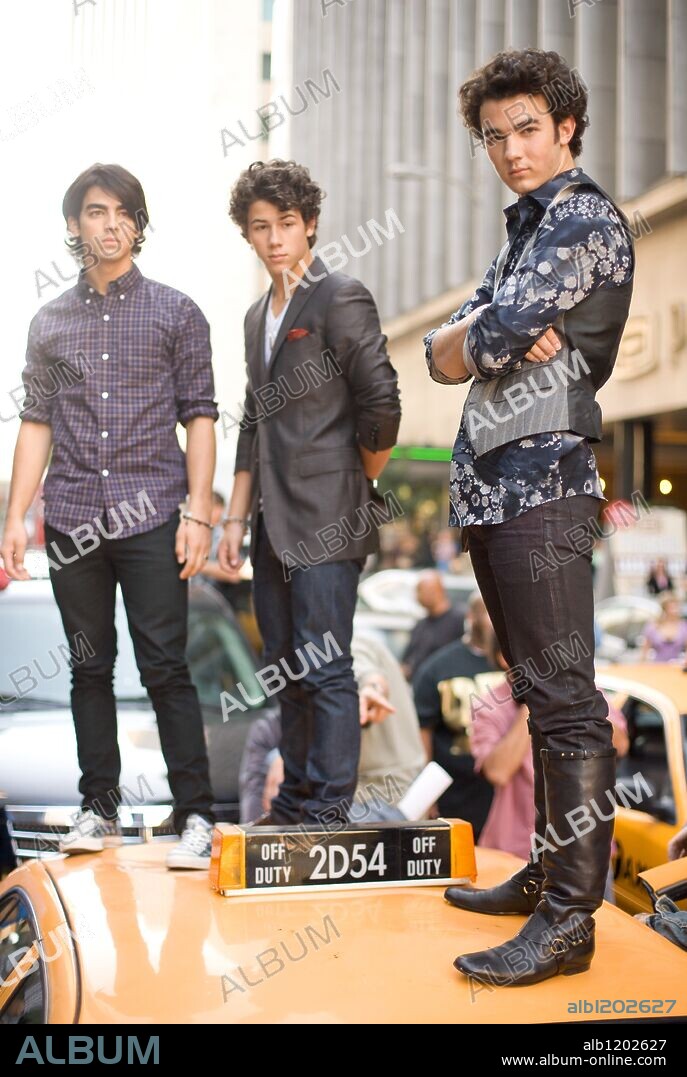 JOE JONAS, KEVIN JONAS and NICK JONAS in JONAS BROTHERS: THE 3D CONCERT EXPERIENCE, 2009, directed by BRUCE HENDRICKS. Copyright Chapman-leonard studio equipment/ film source/ / EMERSON, SAM.