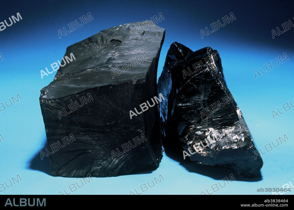 Coal is a black, carbonaceous material that forms as the result of compaction of vegetable debris over long periods of time. Anthracite is a hard, brittle material containing more than 90% carbon. It is lustrous, and burns slowly with a smokeless flame.