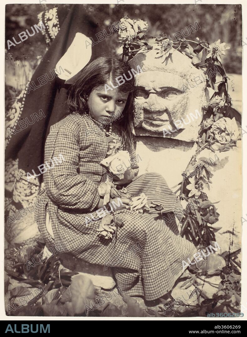 [Young Girl in Checked Dress with Roses, Sicily, Italy]. Artist: Wilhelm von Gloeden (Italian, born Germany, 1886-1931). Dimensions: 22.5 x 17.0 cm. (8  7/8  x 6  11/16  in.). Date: 1899.