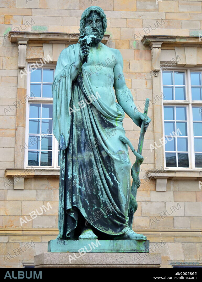 Denmark, Copenhagen: Statue of Asclepius was a god of medicine in ancient Greek religion. By H W Bissen 1847.