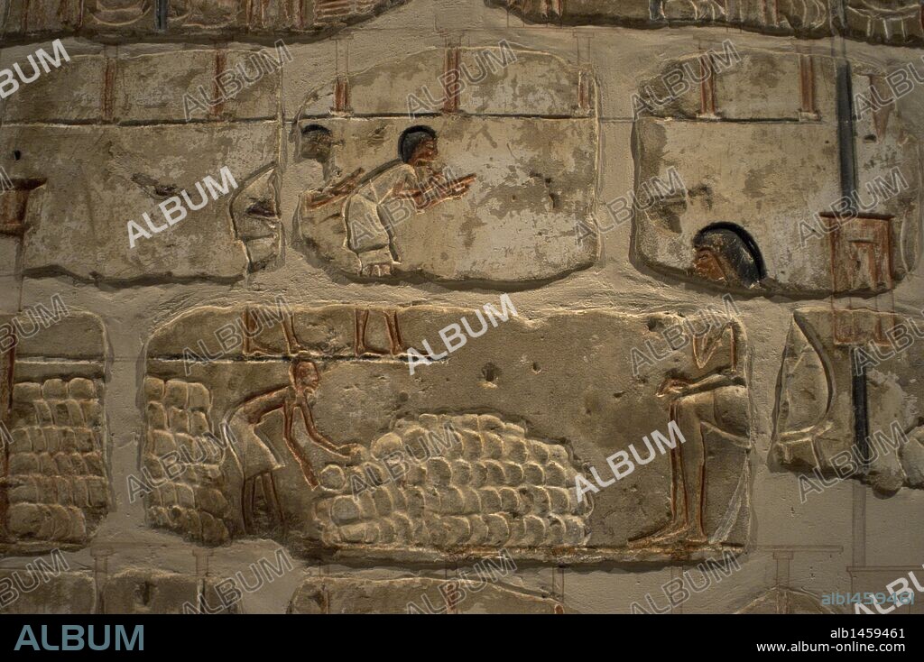 Egyptian art. Talatat walls from the temple of Amenhotep IV. Composed of 283 blocks of polychromed sandstone. Storage of goods in the temple. 18th Dynasty. New Empire. Luxor Museum. Egypt.