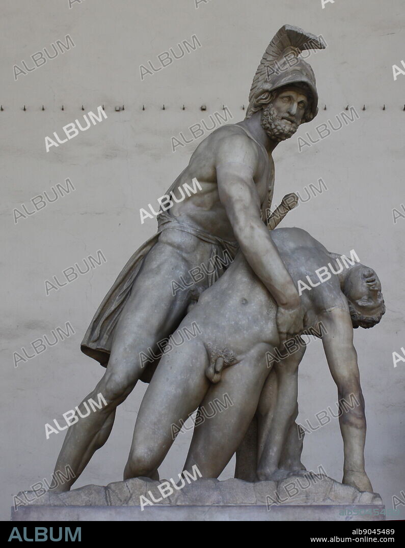 Statue of Menelaus supporting the body of Patroclus in the Loggia della Signoria, Florence, Italy. Now a statue of a man in armour supporting the dying nude body of his comrade, it originated as 2 headless torsos, but underwent extensive improvisatory restorations which altered the statue significantly. The nucleus of the sculpture was made in late 1st century AD as a Roman copy of a Hellenistic original. It underwent changes and adjustments regularly all the way until 1830.