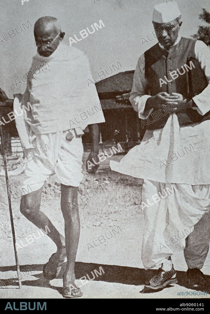 Mahatma Gandhi and Jawaharlal Nehru, at Sevagram a village in the state of Maharashtra, India. Mohandas Gandhi (1869 1948) was the preeminent leader of the Indian independence movement in British-ruled India. Nehru (1889-1964 was the First Prime Minister of India in 1948. Sevagram was the place of Mohandas Gandhi's ashram and his residence from 1936 to his death in 1948.
