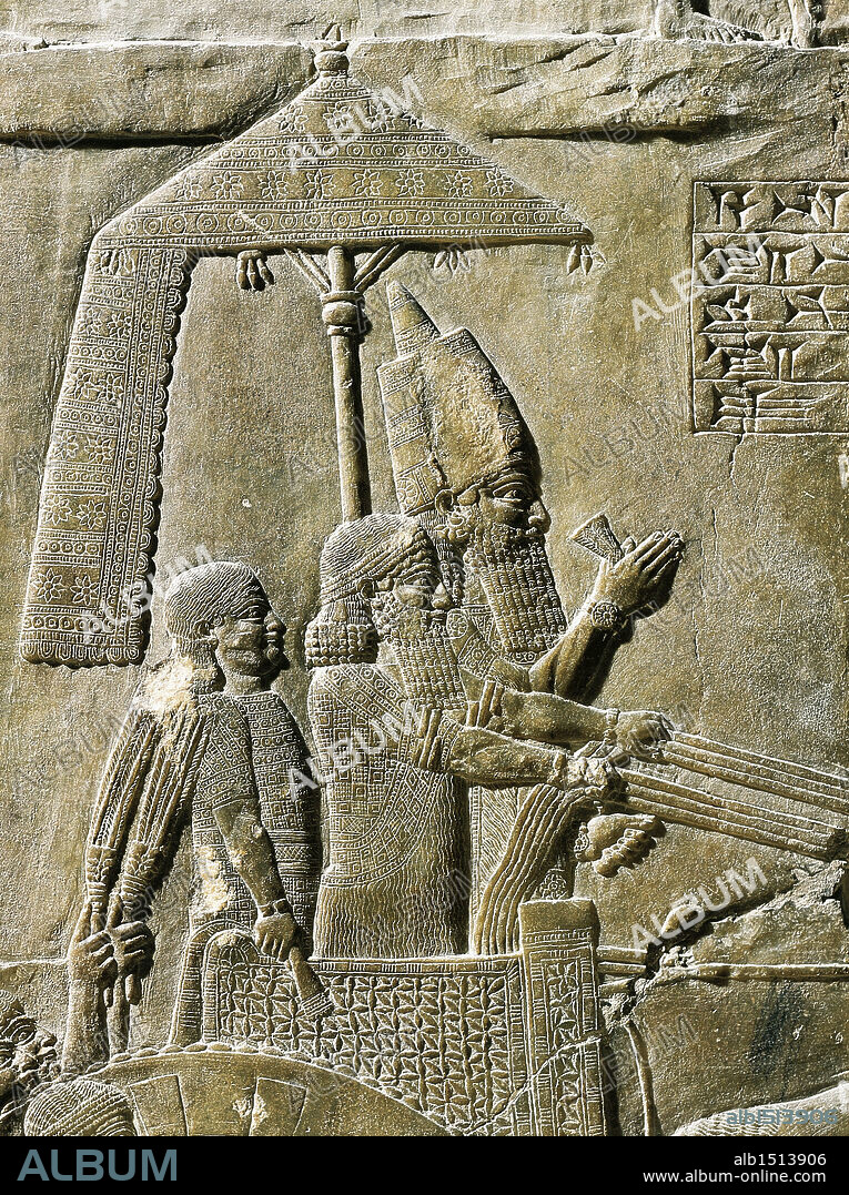 Assyrian civilization, 8th century b.C. Relief depicting king Ashurbanipal on his chariot. From the Palace of Ashurbanipal at Nineveh, Iraq. Detail.