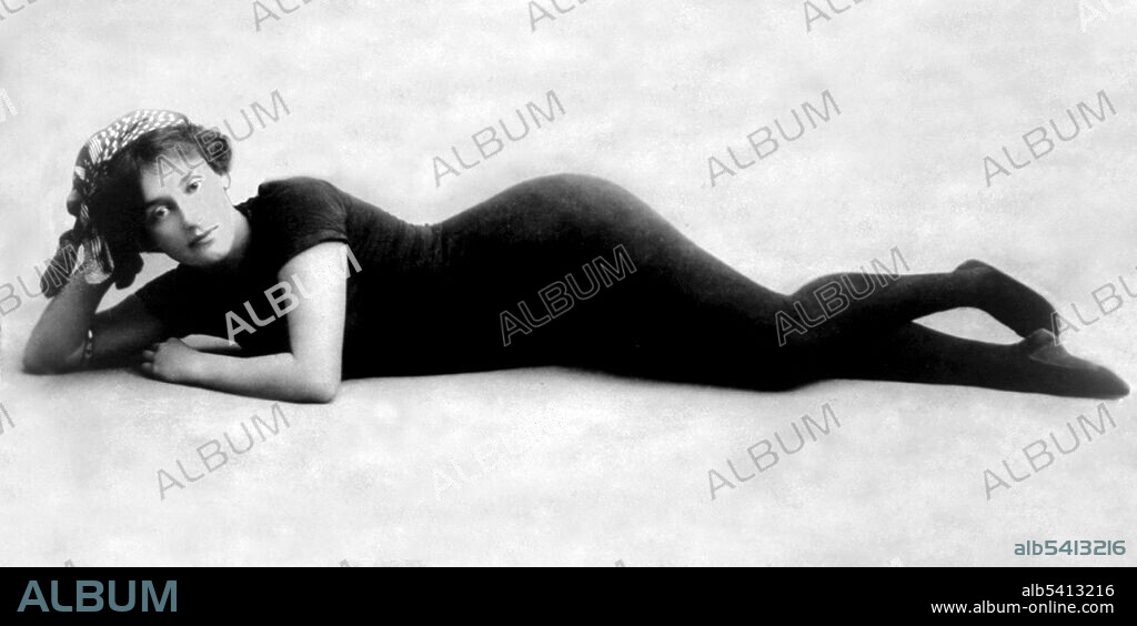 Annette Kellermann (1887 - 1975) was a famous Australian professional swimmer, vaudeville star, film actress, and writer. She was one of the first women to wear a one-piece bathing suit and helped popularize the sport of synchronized swimming. She appeared in several films, and as the star of "A Daughter of the Gods: was the first major actress to appear nude in a Hollywood production. No photographer credited, undated.