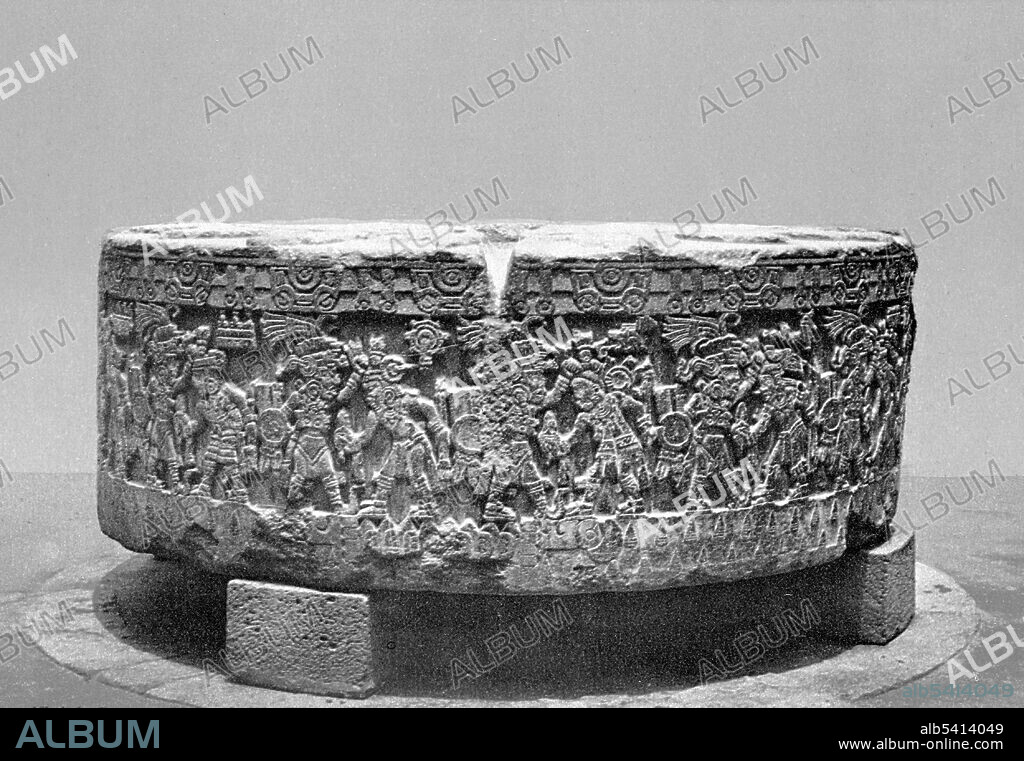The Stone of Tizoc is a large, round, carved Aztec stone made of basalt. It is thought to have been a Cuauhxicalli, in which the hearts of victims of sacrifice were placed. The importance of the Stone of Tizoc is that it was used during the human sacrifices, which Tizoc the emperor wanted glorified through his name. In addition, the emperor of the Aztecs would tend to conceive his children on this rock, soaking in the blood of his enemies. The Aztec sacrifice was held at the top of temples on specially chosen mountains such as Tenochtitlan, Texcoco, and Tlacopan in which priests had the victims tied to a large, flat stone and then proceeded to cut their hearts out, lifting it up to the sun as an offering. The bodies were either thrown down the temple stairs or the heads were impaled on a rack, also known as a tzompantli. Photographed by William Henry Jackson for Detroit Publishing Company, circa 1884-1900.