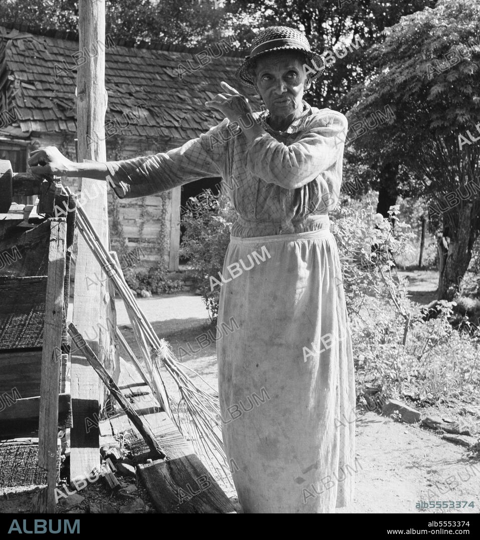 DOROTHEA LANGE. Caroline Atwater, wife of Negro owner, tells how they got their place.