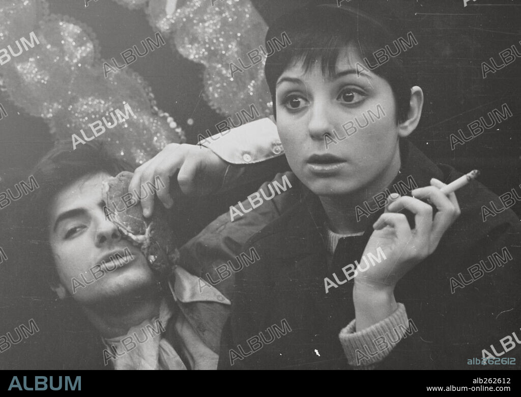 BLACK EYE, RAMON PONS and TINA SAINZ. RAMON PONS and TINA SAINZ in UN, DOS, TRES... AL ESCONDITE INGLES, 1970, directed by IVAN ZULUETA. Copyright EL IMAN.