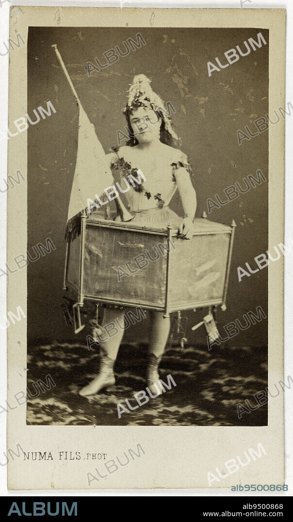 Portrait of Laure Dordet (-1900), known as Milla, theater actress, holding a trumpet, Numa Fils, Photographer, Between 1860 and 1890, 2nd half of the 19th century, Graphic Arts, Photography, Albumen print, Height: 8.8 cm, Width: 5.3 cm.