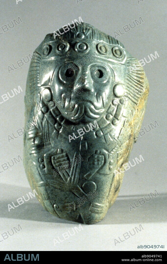 Tlaloc, c. 1200-1519, Central Mexico, Aztec, 13th-16th century, greenstone. carved in low relief to portray the Aztec rain god Tlaloc, a patron of agriculture and holds a stalk of maize in one hand. To the Aztecs, Tlaloc was an ancient and civilized god.