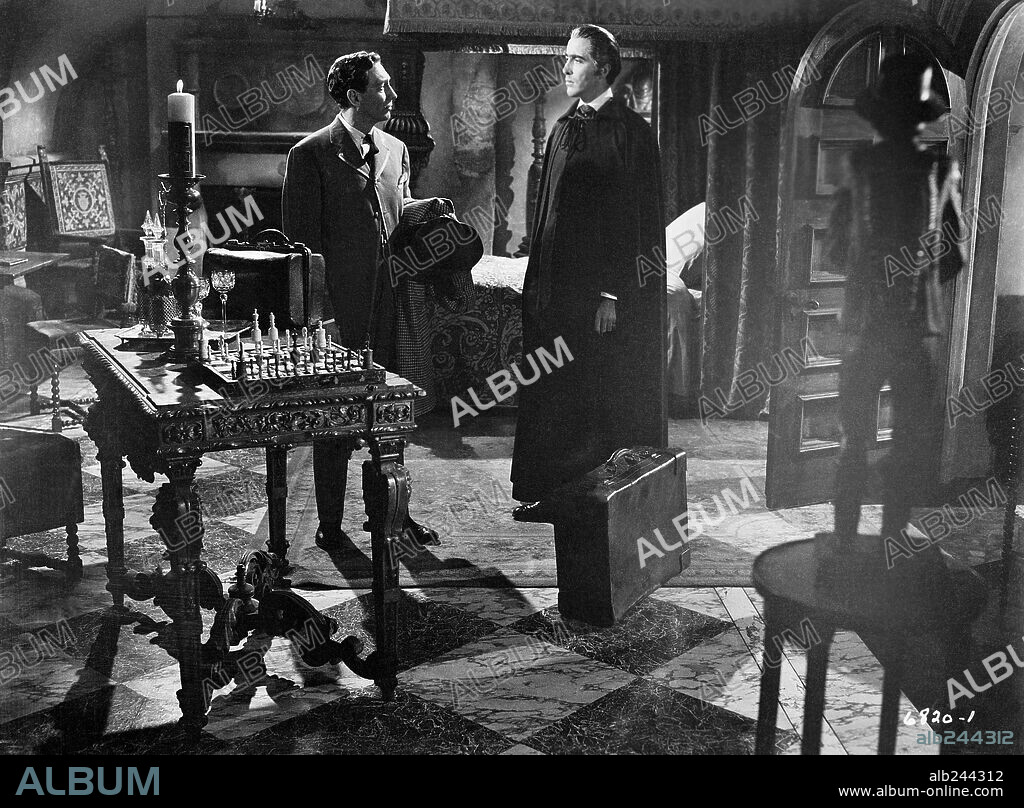 CHRISTOPHER LEE and JOHN VAN EYSSEN in DRACULA, 1958, directed by TERENCE FISHER. Copyright HAMMER FILM PRODUCTIONS.