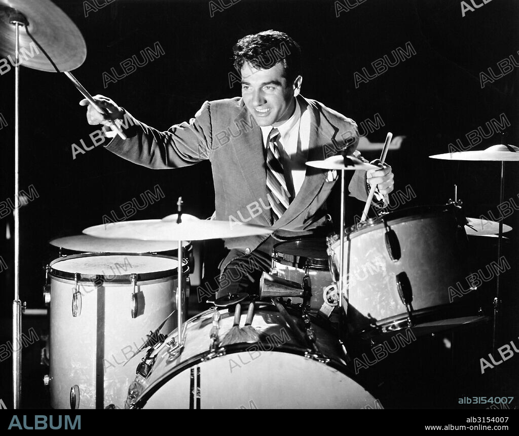 United States:  c. 1947 Jazz drummer and compser Gene Krupa playing the drums.
