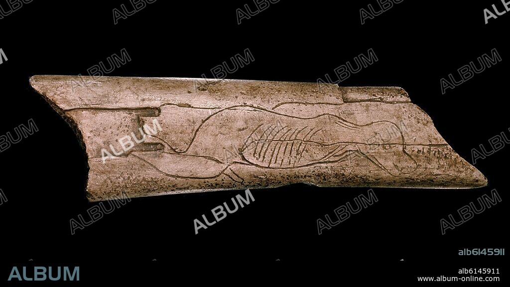 *HUESO TALLADO ANTROPOMORFO-PROC DE LA MADELAINE-DORDOGNA-PALEOLITICO SUPERIOR.