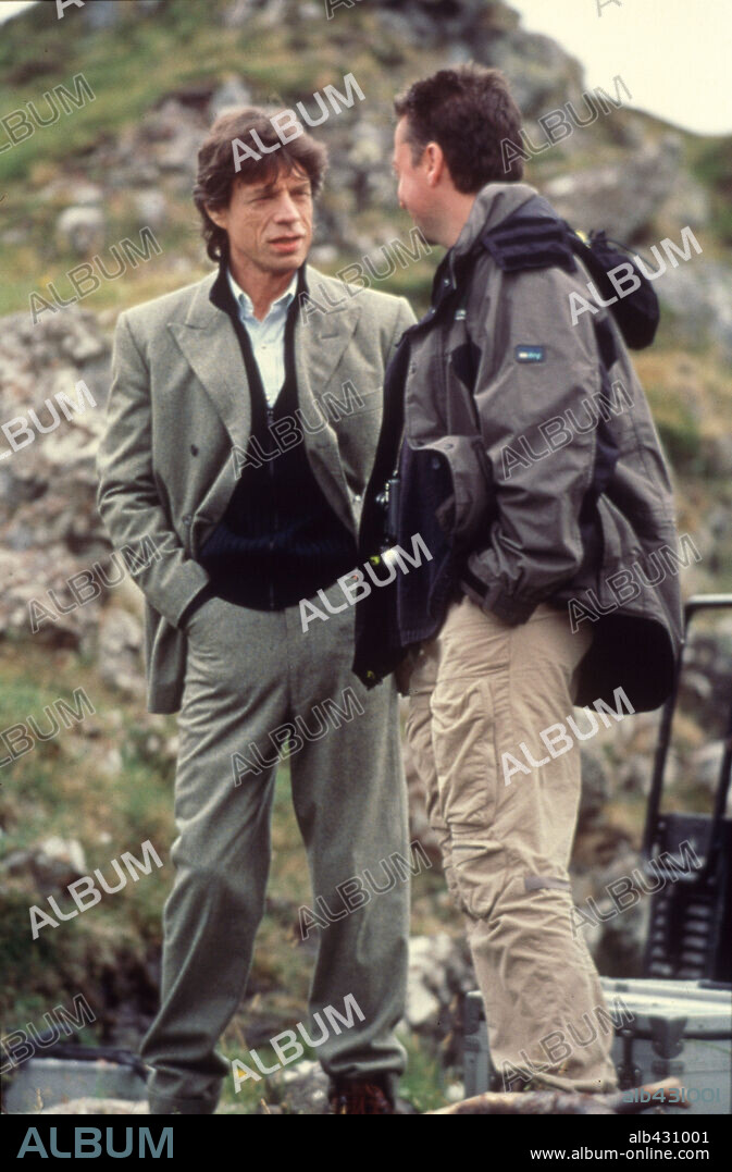 MICK JAGGER in ENIGMA, 2001, directed by MICHAEL APTED. Copyright JAGGED FILMS/INTERMEDIA FILM EQUITIES/BROADWAY PICT/SENATOR.