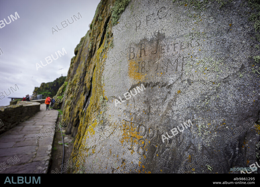 pilgrim graffiti on the steep path up to the monastery, Skellig Michael island, Mainistir Fhionáin (St. Fionans Monastery), county Kerry, Ireland, United Kingdom.