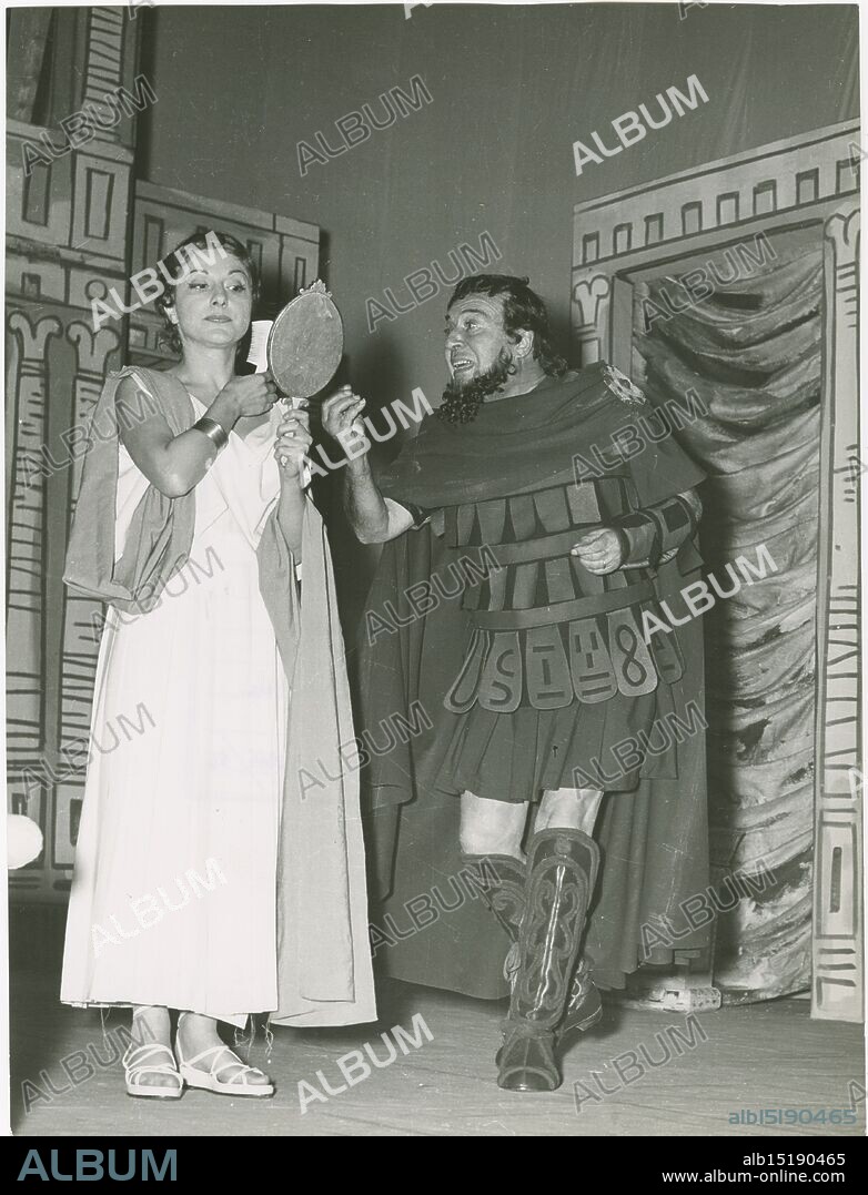 Piccolo Teatro of the City of Genoa. 1955-56 theater season. Valeria Valeri and Annibale Ninchi during the performance of the comedy Amphitryon by Plautus.