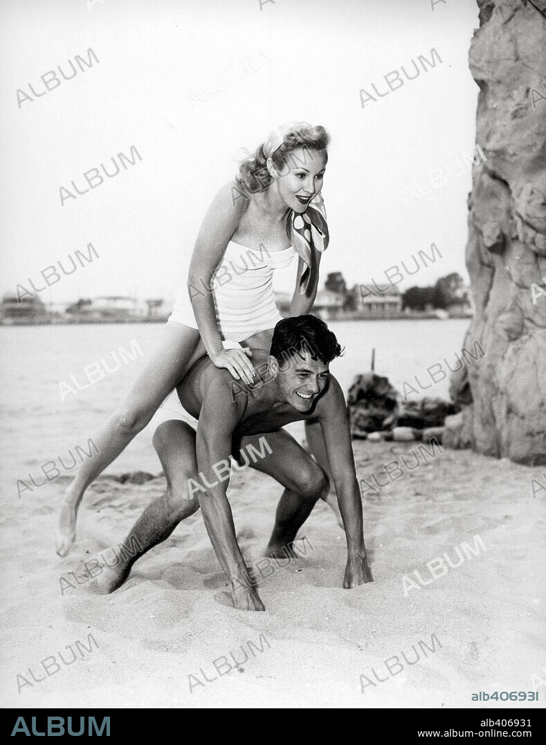 RONALD REAGAN and VIRGINIA MAYO in THE GIRL FROM JONES BEACH, 1949, directed by PETER GODFREY. Copyright WARNER BROTHERS.