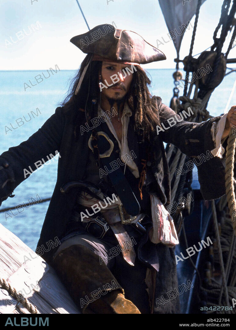 JOHNNY DEPP in PIRATES OF THE CARIBBEAN: THE CURSE OF THE BLACK PEARL, 2003, directed by GORE VERBINSKI. Copyright TOUCHSTONE PICTURES.