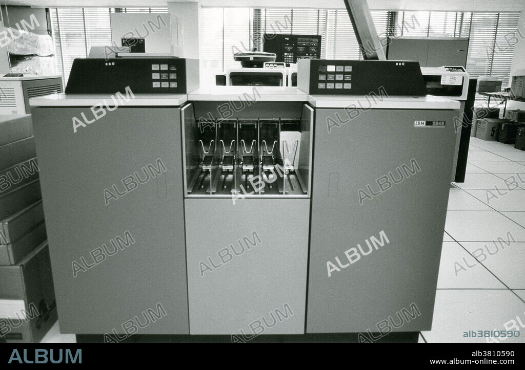 Historic image of an IBM 2540 card reader, used in conjunction with the IBM System/360. This IBM 2540 card reader is an input device which reads information punched into cards and then transfers it into the computer's memory.