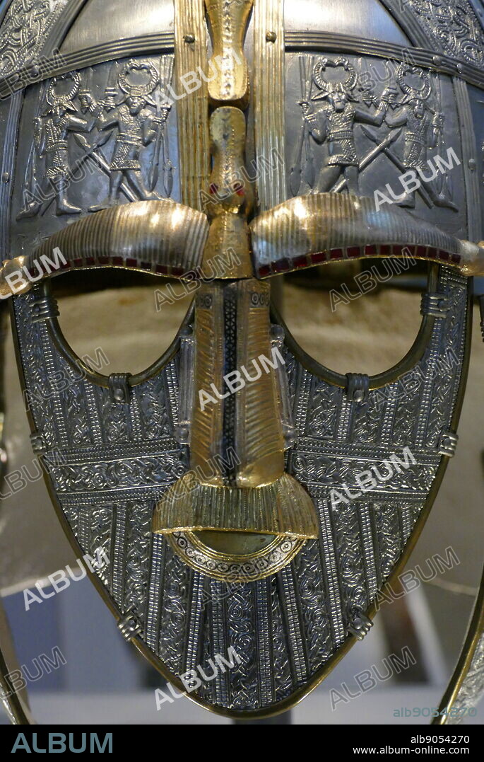 reconstruction of the Sutton Hoo helmet, a decorated Anglo-Saxon helmet discovered during the 1939 excavation of the Sutton Hoo ship-burial. Buried around 625 AD. it is believed to have been the helmet of King Raedwald; for whom its elaborate decoration may have given it a secondary function almost akin to a crown.