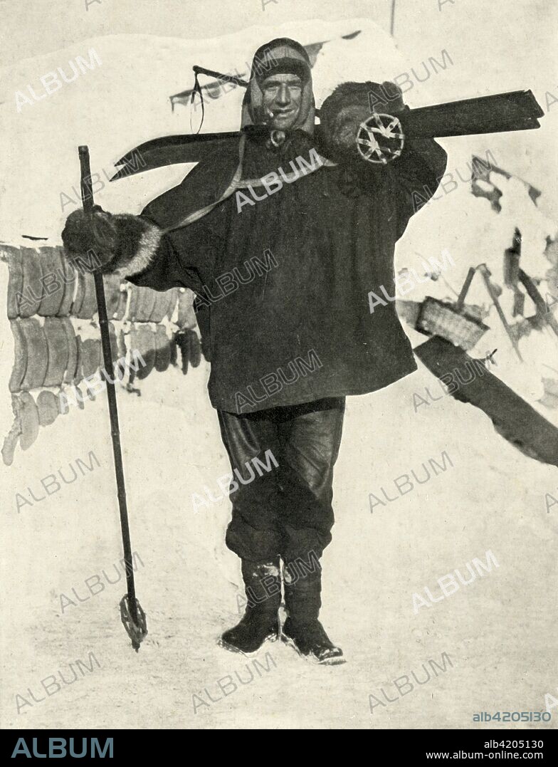 'Petty Officer Crean (Who received the Albert Medal)', 1911, (1913). Tom Crean (1877-1938) in sledging outfit, holding skis and ski poles and smoking a pipe. He was awarded the Albert Medal for rescuing fellow expedition members Edward Evans and William Lashly. The final expedition of British Antarctic explorer Captain Robert Falcon Scott (1868-1912) left London on 1 June 1910 bound for the South Pole. The Terra Nova Expedition, officially the British Antarctic Expedition (1910-1913), included a geologist, a zoologist, a surgeon, a photographer, an engineer, a ski expert, a meteorologist and a physicist among others. Scott wished to continue the scientific work that he had begun when leading the Discovery Expedition to the Antarctic in 1901-04. He also wanted to be the first to reach the geographic South Pole. Scott, accompanied by Dr Edward Wilson, Captain Lawrence Oates, Lieutenant Henry Bowers and Petty Officer Edgar Evans, reached the Pole on 17 January 1912, only to find that the Norwegian expedition under Amundsen had beaten them to their objective by a month. Delayed by blizzards, and running out of supplies, Scott and the remainder of his team died at the end of March. Their bodies and diaries were found eight months later. From Scott's Last Expedition, Volume I. [Smith, Elder & Co., London, 1913].