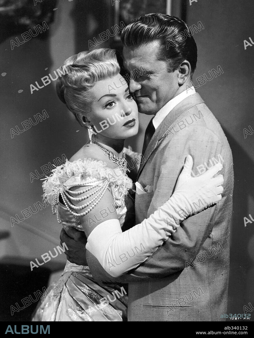 KIRK DOUGLAS y LANA TURNER en CAUTIVOS DEL MAL, 1952 (THE BAD AND THE BEAUTIFUL), dirigida por VINCENTE MINNELLI. Copyright M.G.M.
