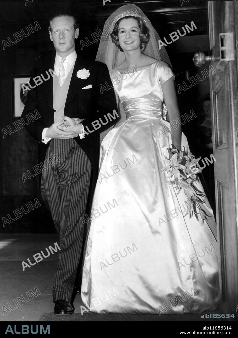 Robin Douglas Home and his bride Sandra Paul as they leave St James's Church after their wedding. 9th July 1959.