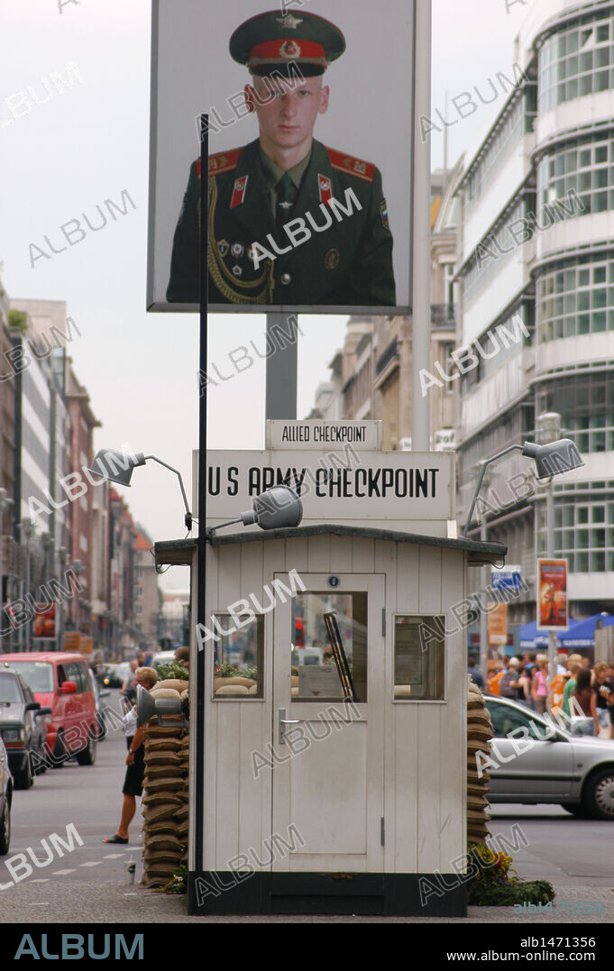 Checkpoint Charlie. The most famous of the crossing points of the Berlin Wall between the two parts of the city. Photography of a soldier and the reconstruction of the gatehouse. Berlin. Germany.