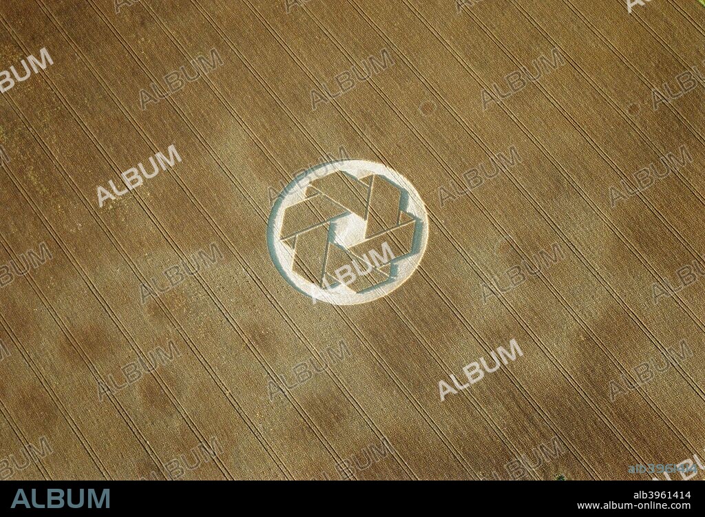 Crop circle near Avebury, Wiltshire, 1999. Some people regard crop circles as evidence of UFO contact or spiritual activity. Others believe they are hoaxes.