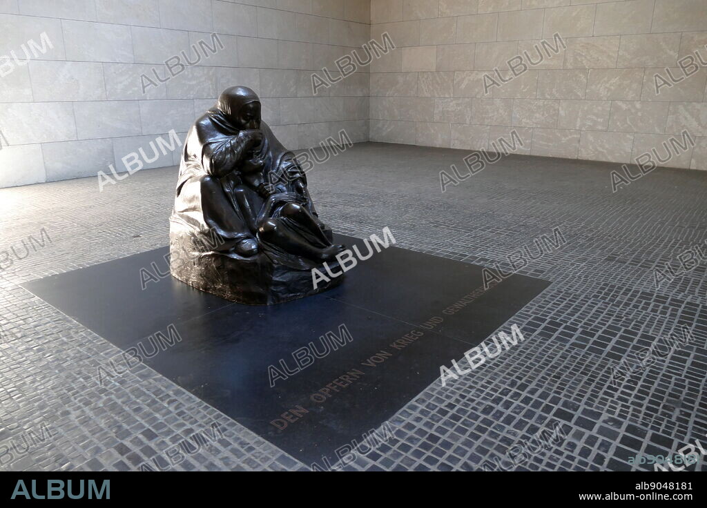 The Neue Wache (New Guardhouse) in Berlin, Germany. It serves as the "Central Memorial of the Federal Republic of Germany for the Victims of War and Dictatorship". It is located on the north side of the Unter den Linden boulevard in the central Mitte district. Dating from 1816, the Neue Wache was designed by the architects Karl Friedrich Schinkel and Salomo Sachs. It is a leading example of German Greek Revival architecture.