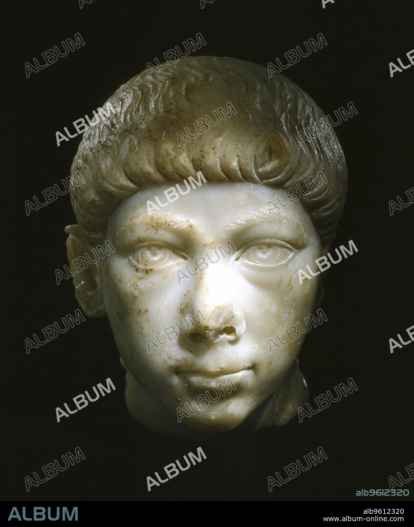 Valentinian II or Gratian, 4th century Roman Emperors. Head of a statue of Valentinian (371-392) or his half-brother Gratian (359-383). Valentinian was made co-emperor with Gratian in 375 when only 4 years of age (Gratian was 17 at the time). Although Gratian had been chosen by their father, Valentinian I, to succeed him, the army favoured Valentinian. Both were murdered, Gratian by the rebel general Magnus Maximus in 383, and Valentinian in 392, probably by order of his Frankish general, Arbogast, with whom he had quarrelled.