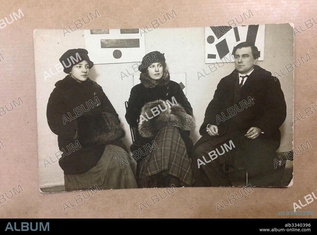 ANONYM. Olga Rozanova, Xenia Boguslavskaya and Kasimir Malevich at the Exhibition 0,10.