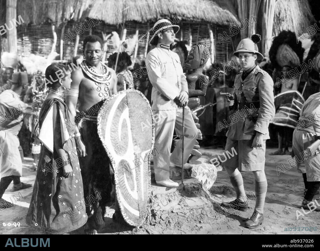 LESLIE BANKS, NINA MAE McKINNEY and PAUL ROBESON in SANDERS OF THE RIVER, 1935, directed by ZOLTAN KORDA. Copyright KORDA.