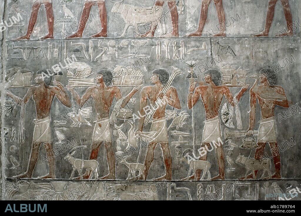 Egypt. Saqqara. Mastaba of Ptahhotep and Akhethotep. 5th Dynasty. Old Kingdom. Egyptian viziers. Father and son. Polychrome relief. Offering bearers.