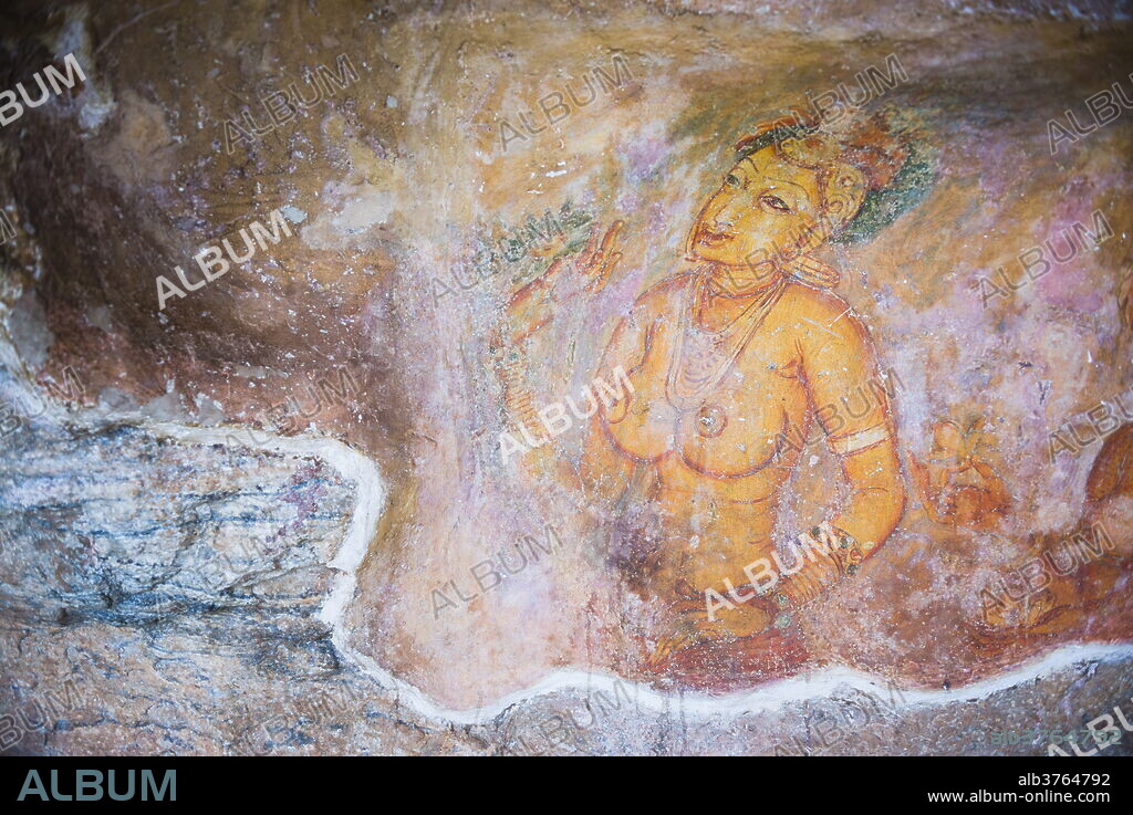 Apsara Frescoes on Mirror Wall at Sigiriya Rock Fortress, UNESCO World Heritage Site, Sri Lanka, Asia.