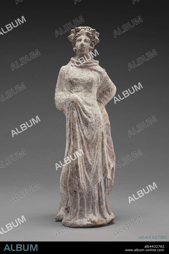 Statuette of a Standing Woman, Unknown, Canosa, South Italy, 325 - 200 B.C., Terracotta with white ground and polychromy (brownish red, pink, light blue, red), 23.5 × 7.3 cm (9 1/4 × 2 7/8 in.).