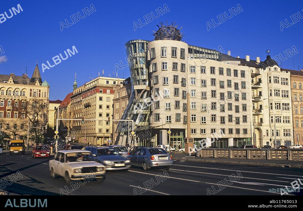 "The Tancici dum or Dancing House or Rasin building or Frank Gehry's 'Fred and Ginger' House at Rasinovo nabr 80 near Jiraskuv most in Prague The work of 20th century architect Frank Gehry it was built in the early 1990s and is said to be shaped like a man and woman dancing, hence 'Fred and Ginger'" *** Local Caption ***.