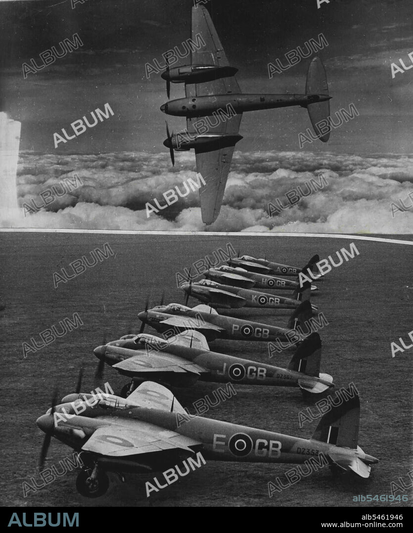 The Mosquito - The world's fastest bomber -- A line of Mosquito planes, drawn up at a British Base, ready to start on an operational flight. December 01, 1942. (Photo by Planet News Ltd.).